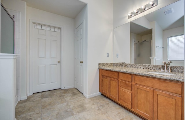 11610 Cross Spring Dr, Pearland, TX 77584 - full bath featuring a shower stall, double vanity, and tile patterned flooring