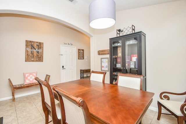 24631 Lakecrest Town Dr, Katy, TX 77493 - dining space with arched walkways and light tile patterned floors