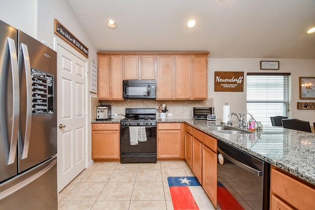 24631 Lakecrest Town Dr, Katy, TX 77493 - kitchen with black appliances, tasteful backsplash, light stone counters, light tile patterned floors, and recessed lighting
