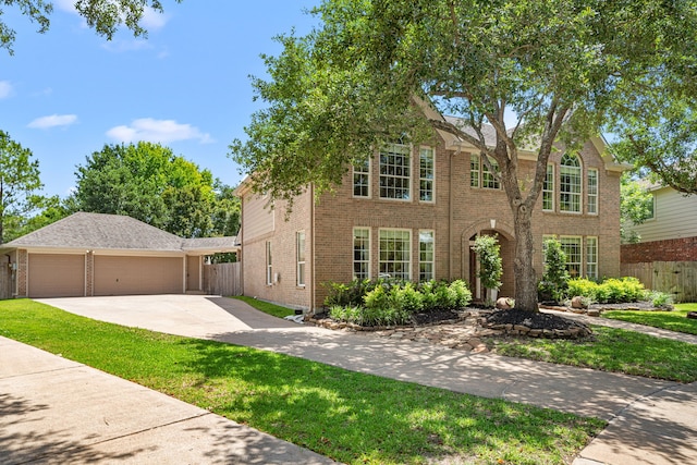 5406 Winlock Trace Ct, Katy, TX 77450 - view of front facade with brick siding, driveway, and a garage