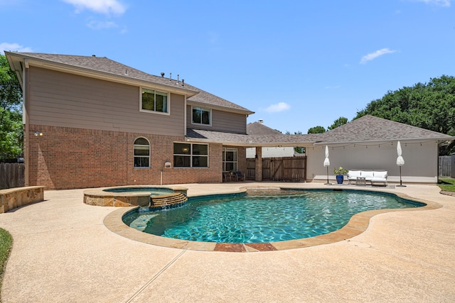 5406 Winlock Trace Ct, Katy, TX 77450 - view of pool with a patio area, a fenced backyard, and a pool with connected hot tub