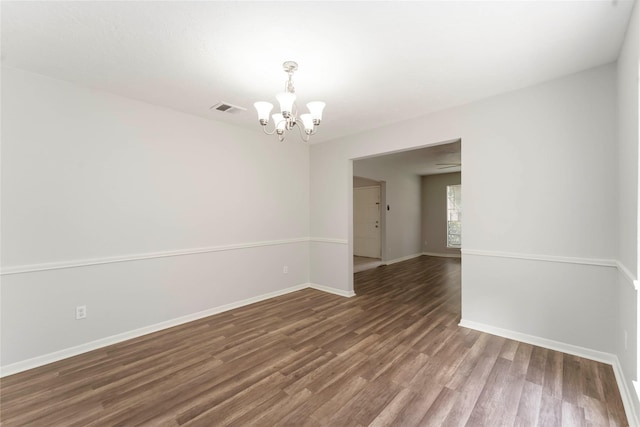 25515 Pepper Ridge Ln, Spring, TX 77373 - empty room with a chandelier and wood finished floors