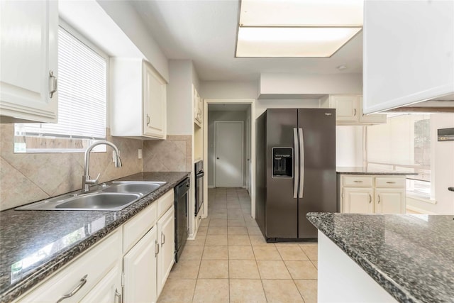 25515 Pepper Ridge Ln, Spring, TX 77373 - kitchen with stainless steel fridge, dishwasher, decorative backsplash, and white cabinets