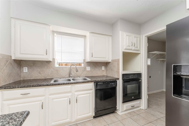 25515 Pepper Ridge Ln, Spring, TX 77373 - kitchen with black appliances, dark countertops, light tile patterned floors, and backsplash