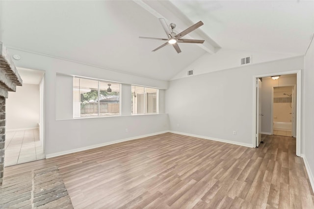 25515 Pepper Ridge Ln, Spring, TX 77373 - unfurnished living room with beamed ceiling, a ceiling fan, light wood finished floors, and high vaulted ceiling