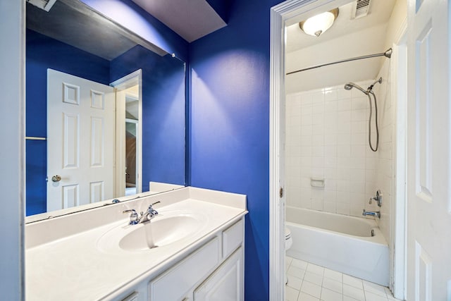2334 River Rock Trl, Kingwood, TX 77345 - bathroom featuring vanity, tile patterned floors, and shower / bathtub combination