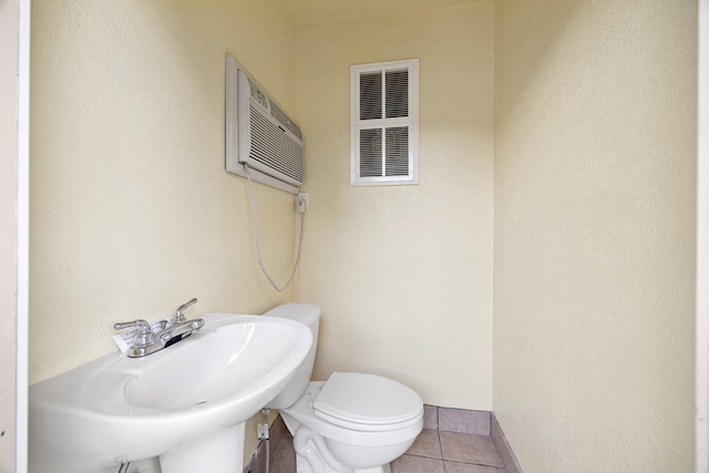 2334 River Rock Trl, Kingwood, TX 77345 - bathroom with tile patterned floors and a wall mounted air conditioner