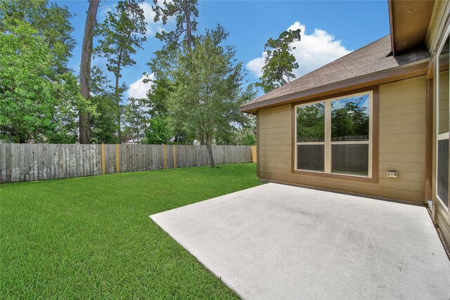 1959 Briar Grove Dr, Conroe, TX 77301 - fenced backyard featuring a patio area