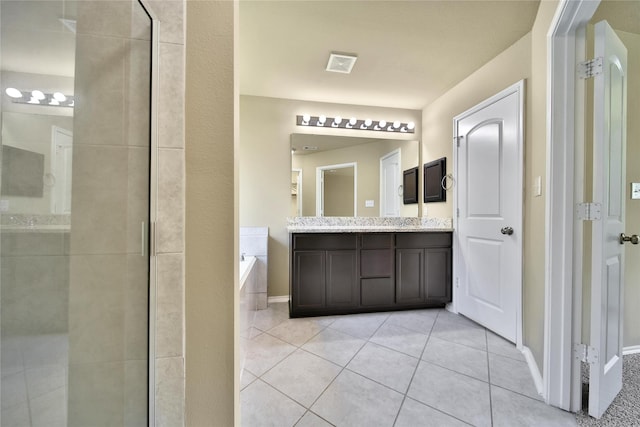 1959 Briar Grove Dr, Conroe, TX 77301 - bathroom featuring double vanity, a bath, tile patterned floors, and tiled shower