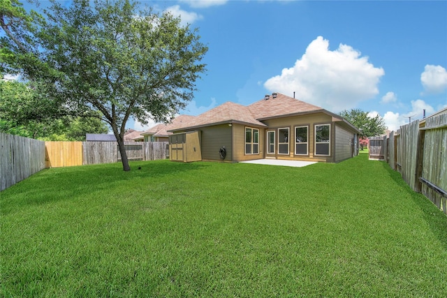 1959 Briar Grove Dr, Conroe, TX 77301 - rear view of house featuring a fenced backyard and a patio