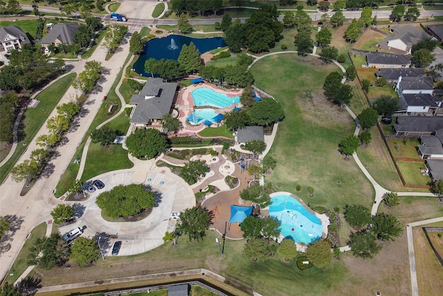 20718 Slate Ct, Richmond, TX 77407 - aerial view of property and surrounding area featuring a pool area and a nearby body of water
