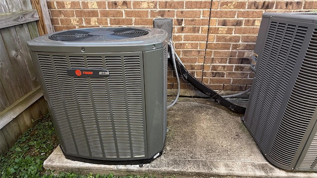 20718 Slate Ct, Richmond, TX 77407 - exterior view of a central AC unit and brick siding
