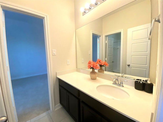 20718 Slate Ct, Richmond, TX 77407 - bathroom with vanity and tile patterned flooring