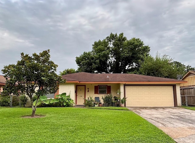 619 Rainy River Dr, Houston, TX 77037 - ranch-style house featuring a garage, concrete driveway, and brick siding