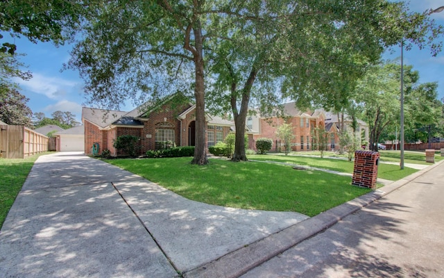 16214 Lobo Ln, Spring, TX 77379 - traditional-style house with brick siding