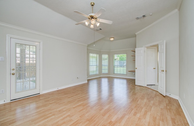 16214 Lobo Ln, Spring, TX 77379 - empty room with vaulted ceiling, ceiling fan, light wood finished floors, and ornamental molding