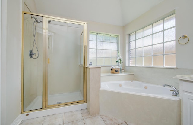 16214 Lobo Ln, Spring, TX 77379 - bathroom featuring a garden tub, a shower stall, tile patterned flooring, and vanity