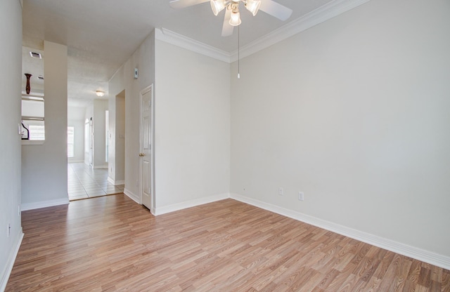 16214 Lobo Ln, Spring, TX 77379 - empty room with light wood-style floors, ceiling fan, and ornamental molding