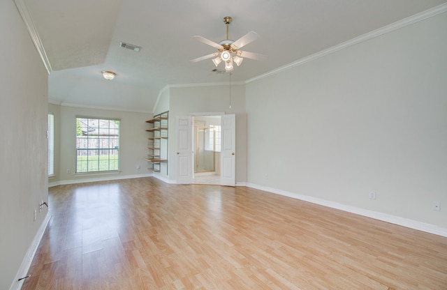 16214 Lobo Ln, Spring, TX 77379 - unfurnished living room featuring ceiling fan, light wood-style flooring, crown molding, and lofted ceiling