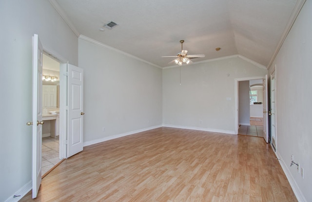 16214 Lobo Ln, Spring, TX 77379 - empty room with light wood-style flooring, ceiling fan, ornamental molding, and vaulted ceiling