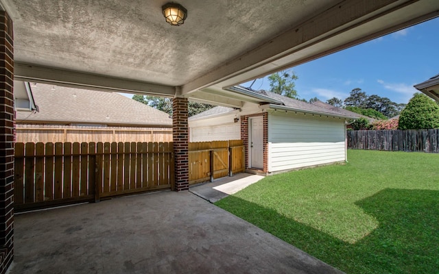 16214 Lobo Ln, Spring, TX 77379 - fenced backyard with a patio area