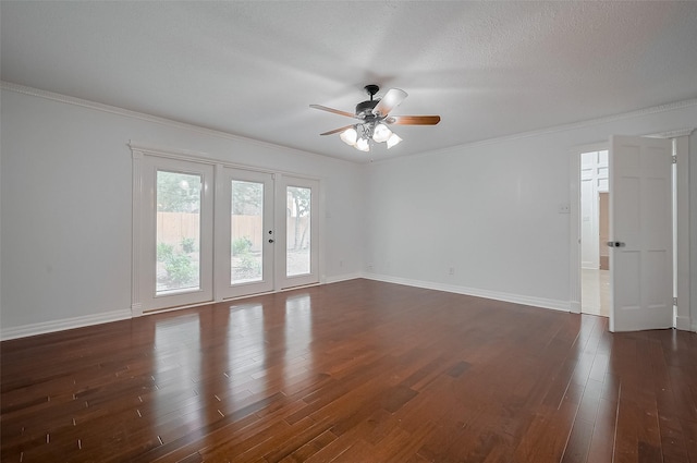 9411 Fenchurch Dr, Spring, TX 77379 - empty room featuring a ceiling fan, dark wood-style floors, ornamental molding, and french doors