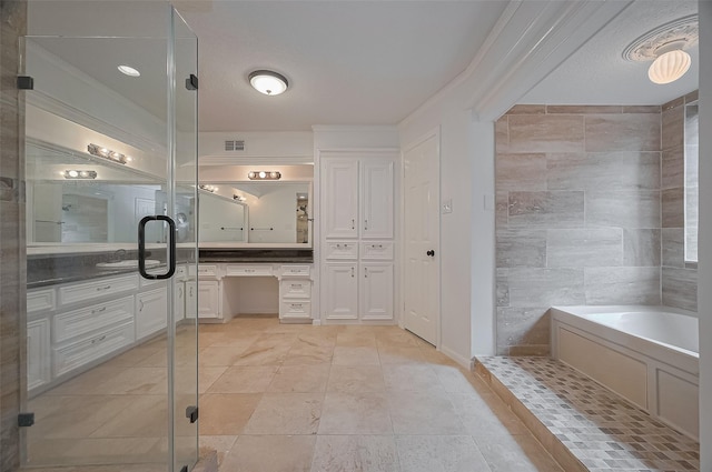 9411 Fenchurch Dr, Spring, TX 77379 - full bath featuring a bath, vanity, and crown molding