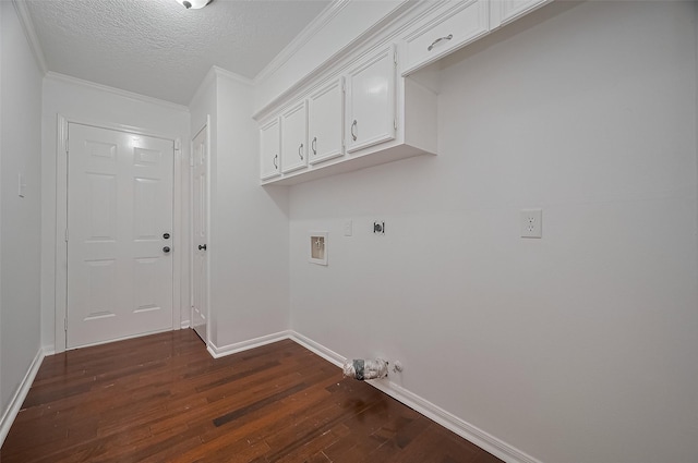 9411 Fenchurch Dr, Spring, TX 77379 - laundry room featuring dark wood-style floors, hookup for an electric dryer, cabinet space, ornamental molding, and hookup for a washing machine