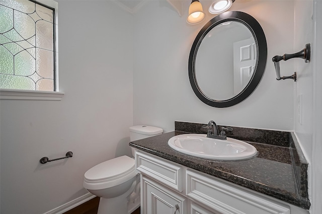 9411 Fenchurch Dr, Spring, TX 77379 - half bathroom featuring vanity and crown molding