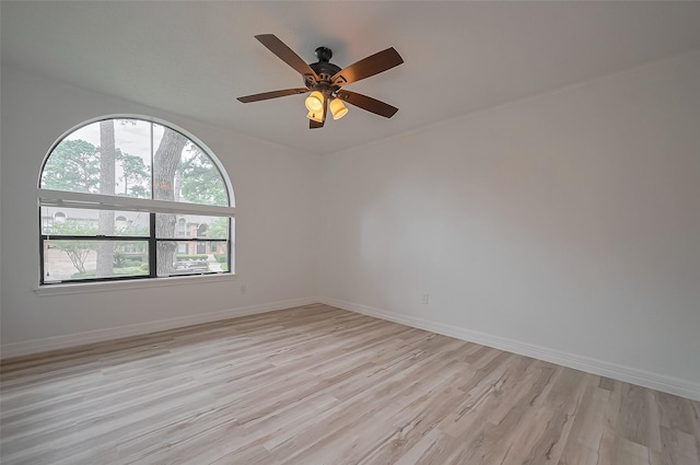 9411 Fenchurch Dr, Spring, TX 77379 - unfurnished room with light wood finished floors and ceiling fan