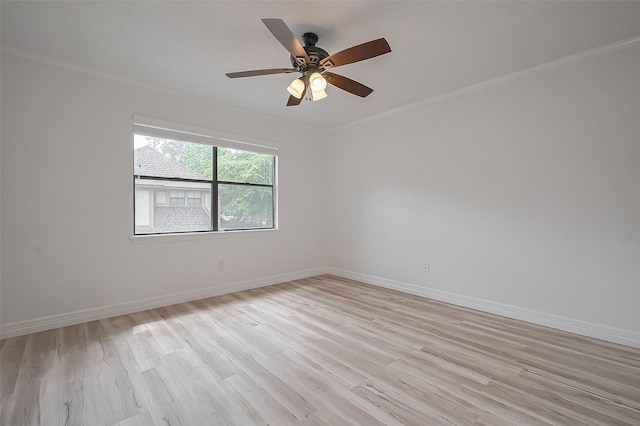 9411 Fenchurch Dr, Spring, TX 77379 - empty room with crown molding, light wood-style floors, and ceiling fan