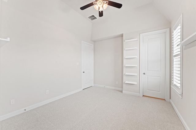 1705 Upland Lks, Houston, TX 77043 - unfurnished bedroom featuring light carpet, vaulted ceiling, and a ceiling fan