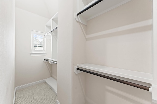 1705 Upland Lks, Houston, TX 77043 - walk in closet with tile patterned flooring