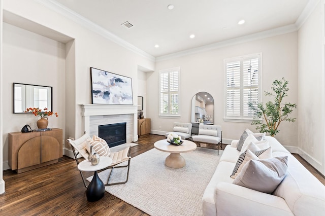 1705 Upland Lks, Houston, TX 77043 - living room with dark wood-type flooring, a fireplace, ornamental molding, arched walkways, and recessed lighting