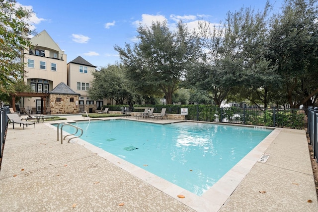 1705 Upland Lks, Houston, TX 77043 - community pool featuring a patio