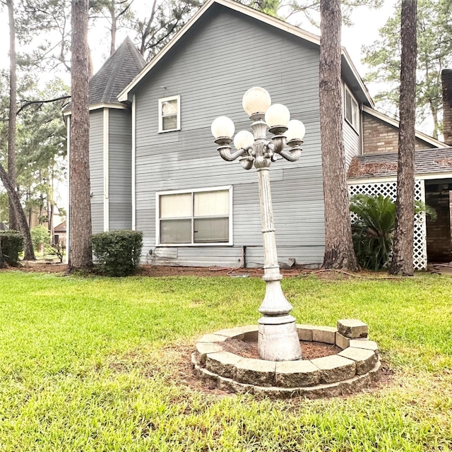 12006 Mill Trail Ln, Houston, TX 77070 - rear view of property with a lawn