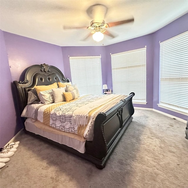 12006 Mill Trail Ln, Houston, TX 77070 - carpeted bedroom with a ceiling fan and baseboards