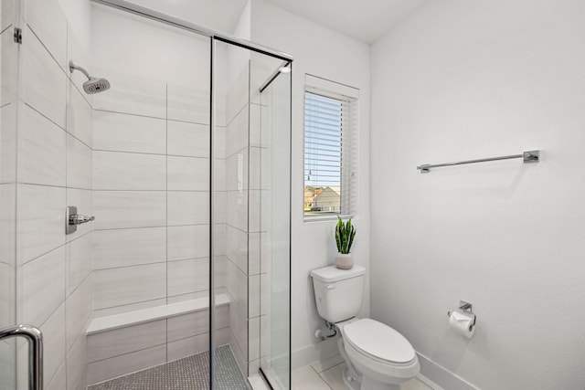 1546 W Tidwell Rd, Houston, TX 77091 - full bathroom featuring a shower stall and tile patterned flooring