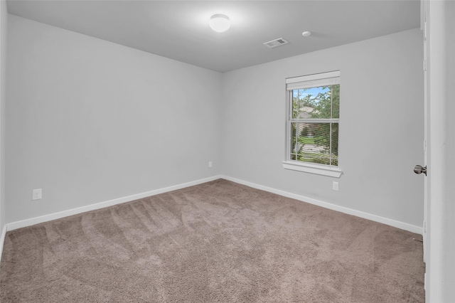 12326 Sabine Point Dr, Humble, TX 77346 - spare room featuring carpet flooring