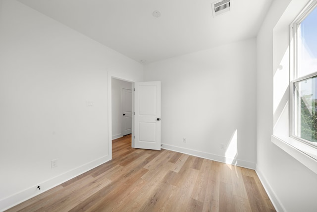 835A Rachel St, Houston, TX 77091 - empty room featuring light wood-style flooring and healthy amount of natural light
