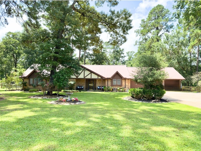 13202 N Decker Dr, Magnolia, TX 77355 - view of front facade featuring a front lawn and driveway