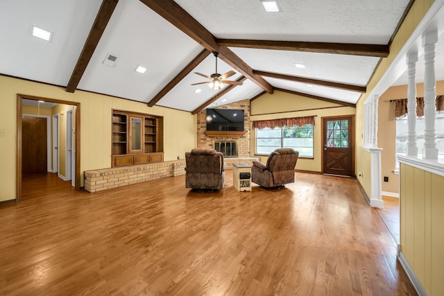 13202 N Decker Dr, Magnolia, TX 77355 - living room with a ceiling fan, a fireplace, and wood finished floors