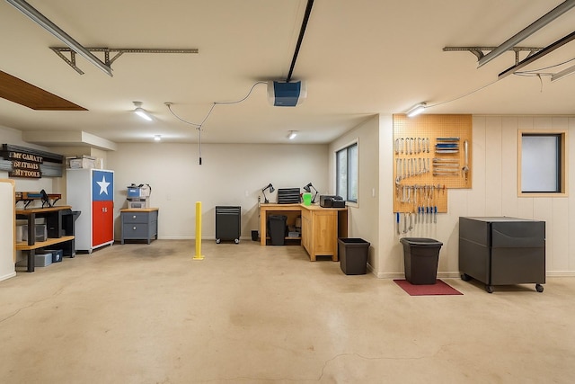 13202 N Decker Dr, Magnolia, TX 77355 - garage featuring a garage door opener and baseboards