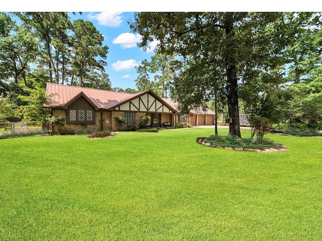 13202 N Decker Dr, Magnolia, TX 77355 - view of green lawn with a garage