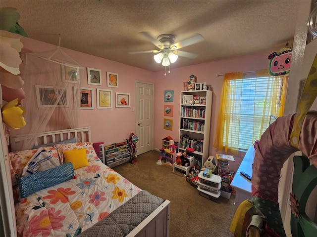 15506 Fir Woods Ln, Cypress, TX 77429 - bedroom featuring carpet flooring, a textured ceiling, and ceiling fan