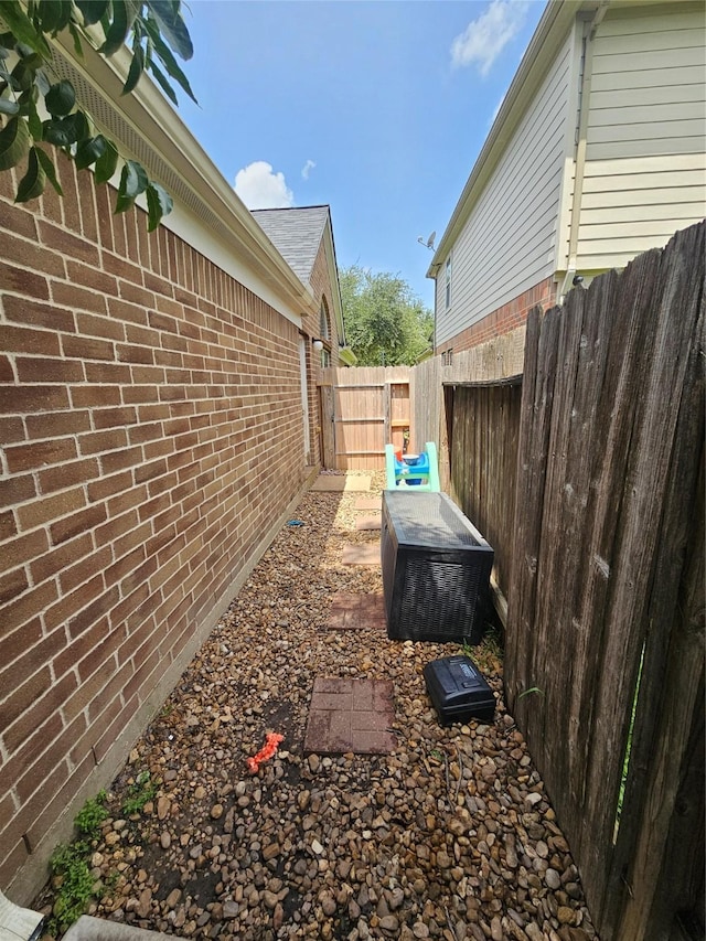 15506 Fir Woods Ln, Cypress, TX 77429 - view of side of home with brick siding