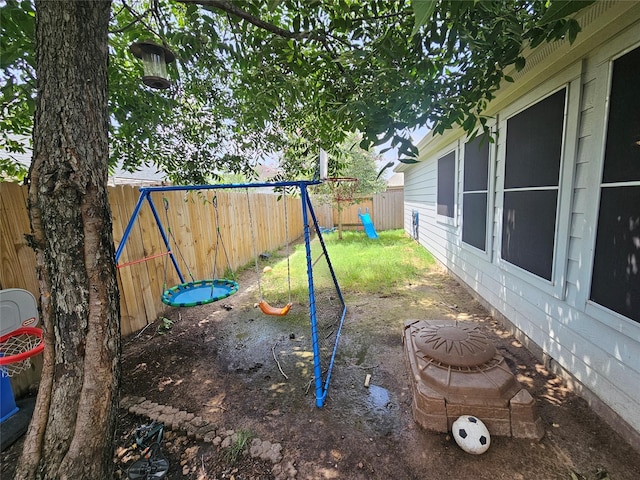 15506 Fir Woods Ln, Cypress, TX 77429 - fenced backyard with a playground