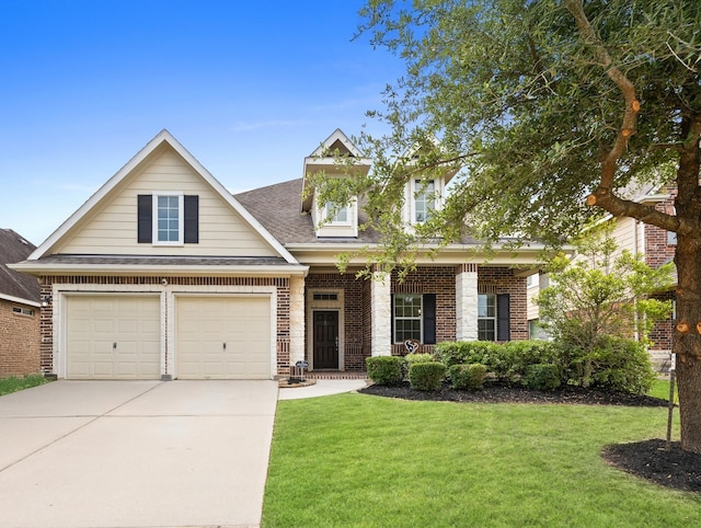 16606 River Wood Ct, Crosby, TX 77532 - view of front of property featuring a front yard, concrete driveway, roof with shingles, and brick siding
