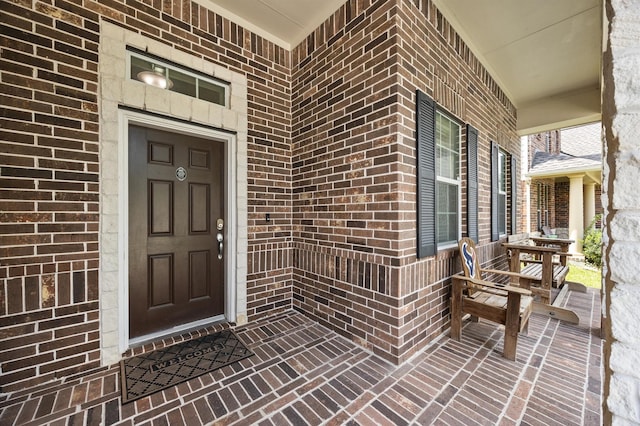 16606 River Wood Ct, Crosby, TX 77532 - property entrance featuring covered porch and brick siding