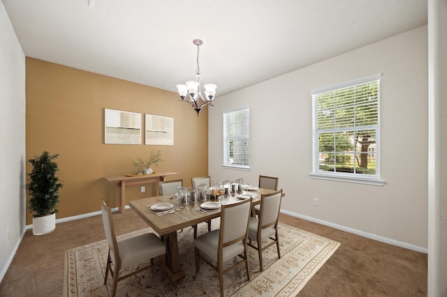 16606 River Wood Ct, Crosby, TX 77532 - carpeted dining space with a chandelier and baseboards